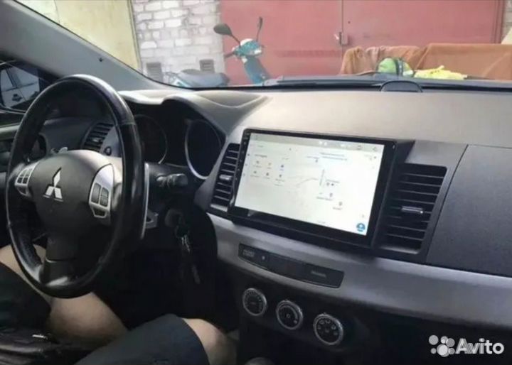 Магнитола Митсубиси Лансер 10