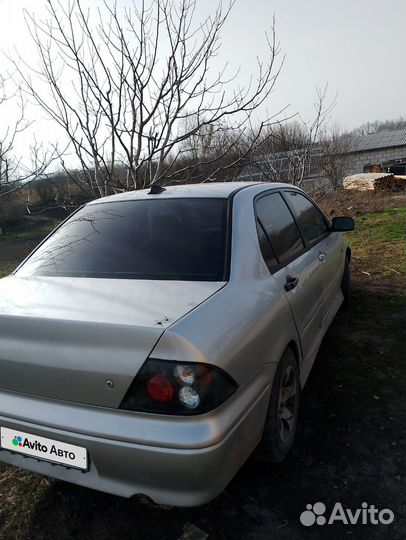 Mitsubishi Lancer Cedia 1.5 CVT, 2000, 200 000 км