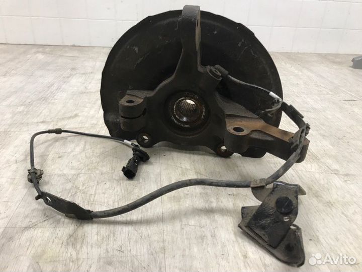 Кулак поворотный передний левый Mitsubishi Lancer