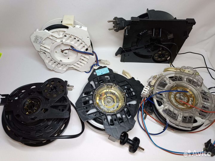 Механизм сматывания шнура пылесоса