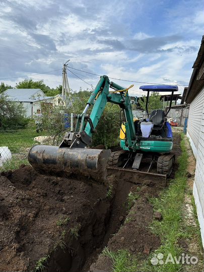 Услуги миниэкскаватора,Миниэкскаватор