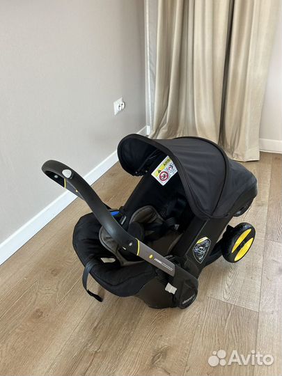 Автолюлька коляска doona с базой isofix