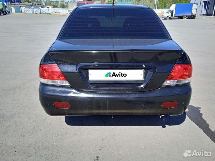 Mitsubishi Lancer 1.6 МТ, 2006, 200 000 км