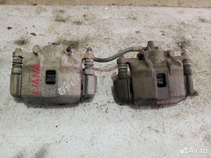 Суппорта передние Suzuki Liana 1.6