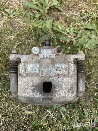 Суппорт передний левый nissan AD