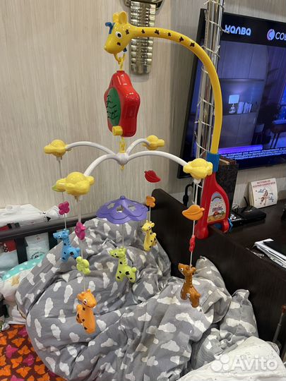 Музыкальная карусель на кроватку