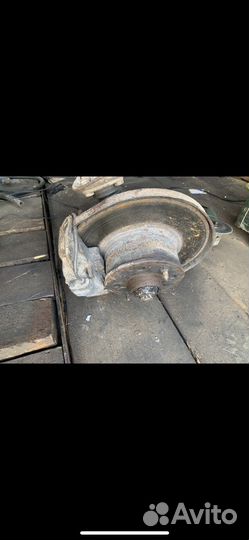 Кулак в сборе с суппортом ваз 2107