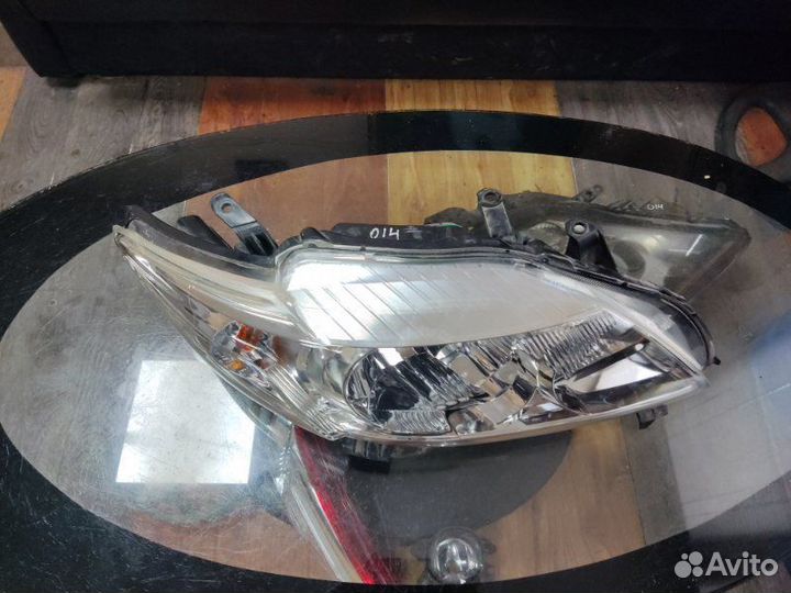 Фара галоген правая Toyota Corolla 150 2006-2009