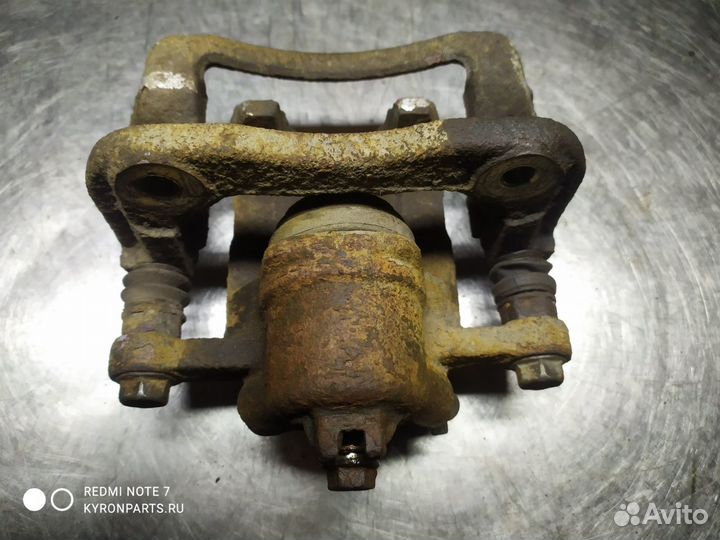 Суппорт тормозной задний правый Ssangyong Actyon