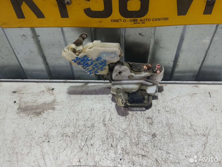 Замок двери задний левый Nissan Almera N16