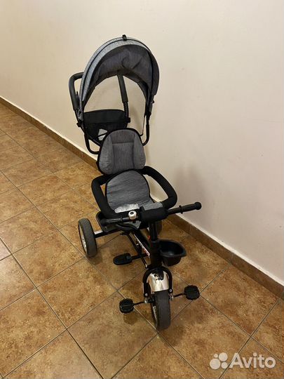 Трехколесный велосипед с ручкой