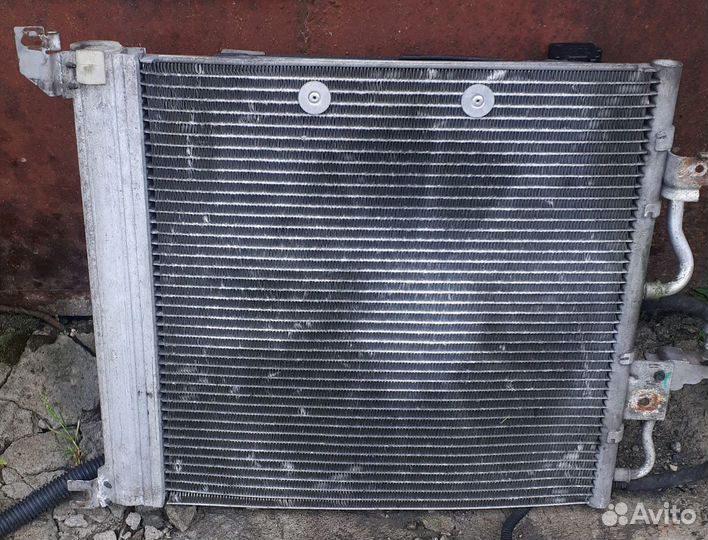 Радиатор вентилятор кондиционера Опель Астра Н