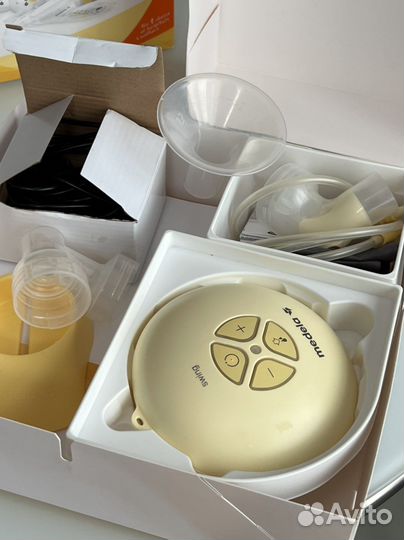 Молокоотсос medela электрический