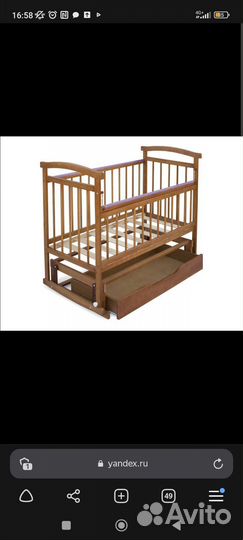 Детская кроватка с маятником и ящиком