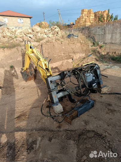 Экскаваторная установка на мини погрузчик unc 060