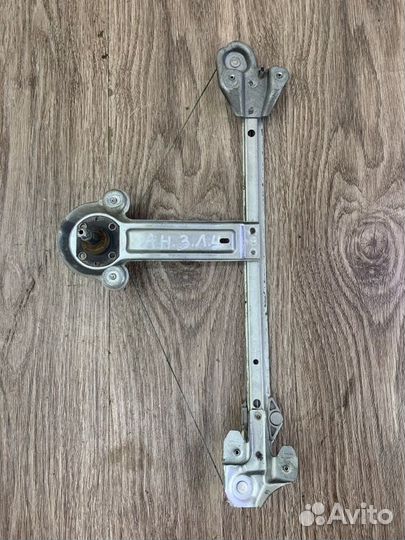 Стеклоподъемник задний левый Opel Astra H