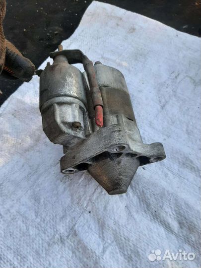 Стартер симбол клио логан 1.4