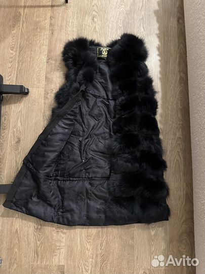 Меховая жилетка