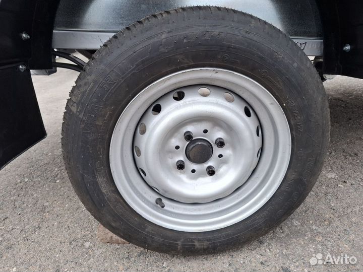 Легковой прицеп Титан 2,5х1,3 борт 0,5м тент 0,6м