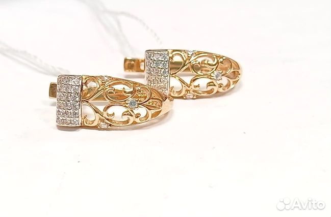 Золотые серьги с камнем