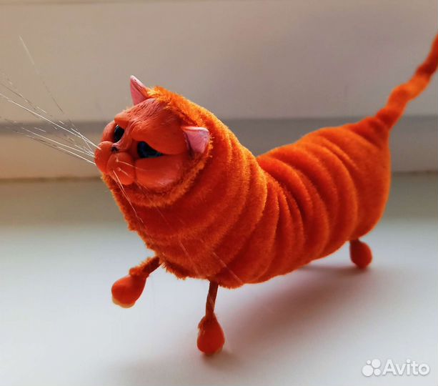 Кот-сарделька рыжий