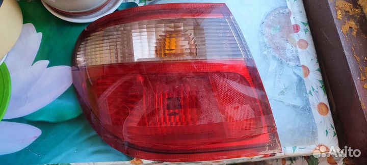 Фонарь задний левый Nissan Almera n16