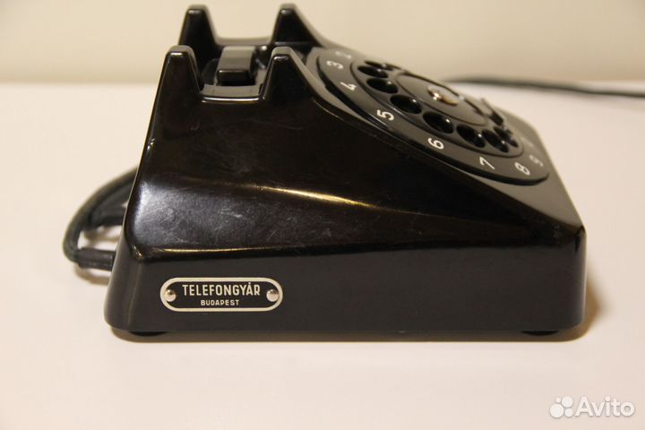 Антикварный телефон фирмы 