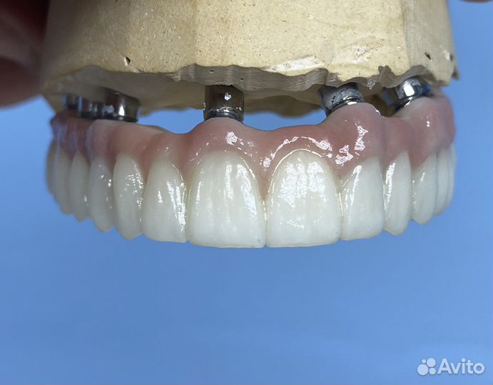 Зубной техник