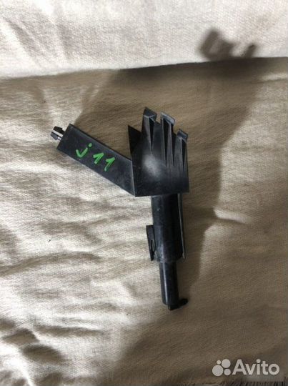 Форсунка омывателя левая Nissan Qashqai J11