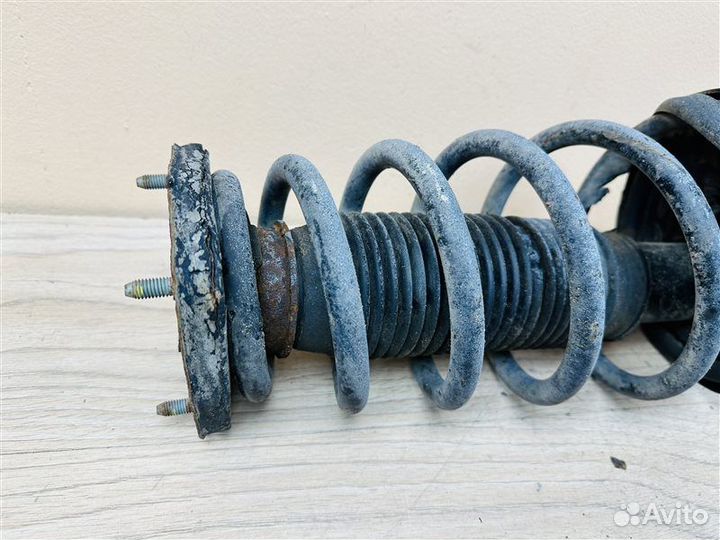 Амортизатор задний левый Hyundai Tucson 1 2.0 ат