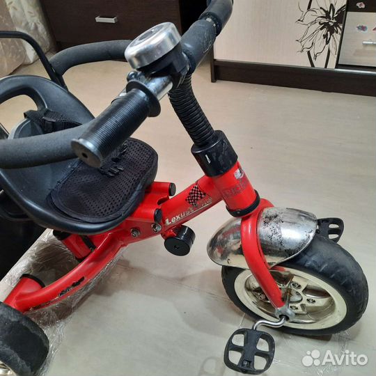 Трехколесный велосипед Rich Toys с ручкой управл