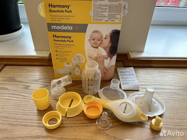 Молокоотсос Medela ручной накладки на грудь пакеты