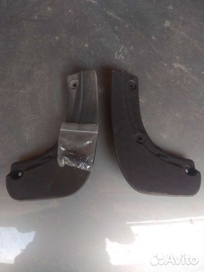 Передние брызговики на opel zafira b