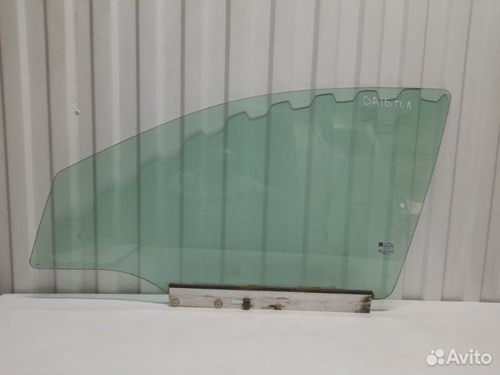 Стекло двери передней левой Opel Astra H