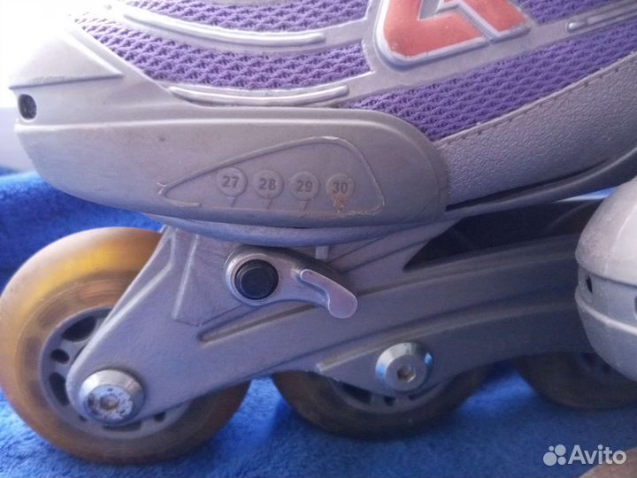 Роликовые коньки