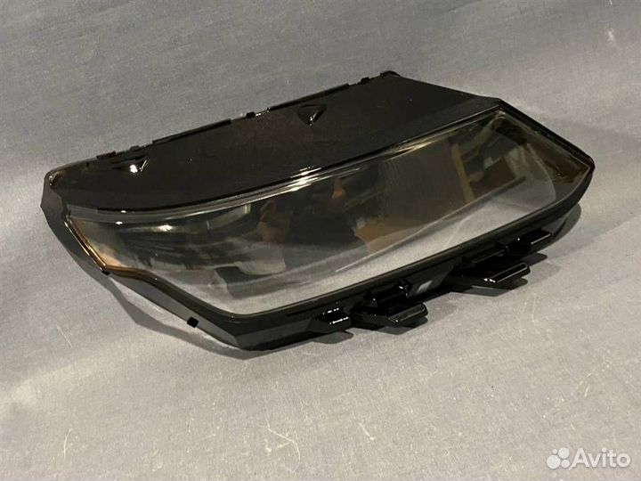Стекло фары правый Geely Coolray