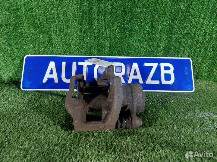 Суппорт тормозной передний левый Peugeot 207