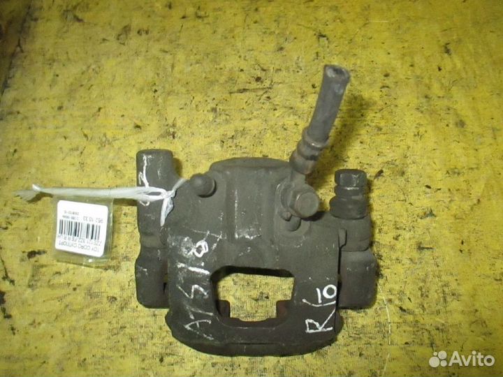 Суппорт Toyota Corolla ZZE121 (Заднее Правое)