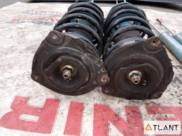 Стойка передняя левая nissan tiida, tiida latio