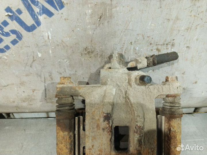 Суппорт тормозной задний правый Chevrolet Lacetti