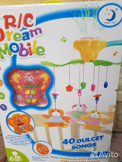 Музыкальный мобиль на кроватку с мягкими зайцами