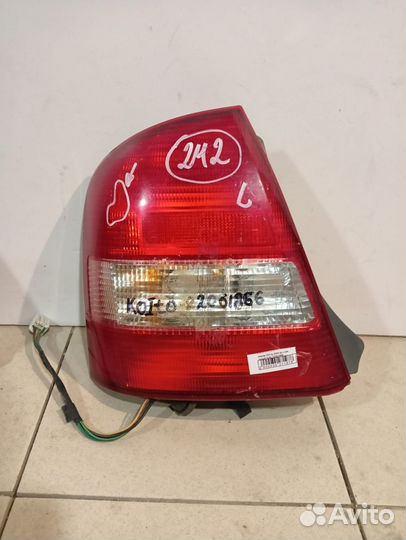 Фонарь mazda 323 koito 22061866