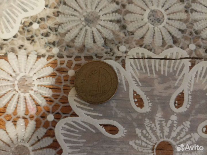 Монета 50 летие первого полёта