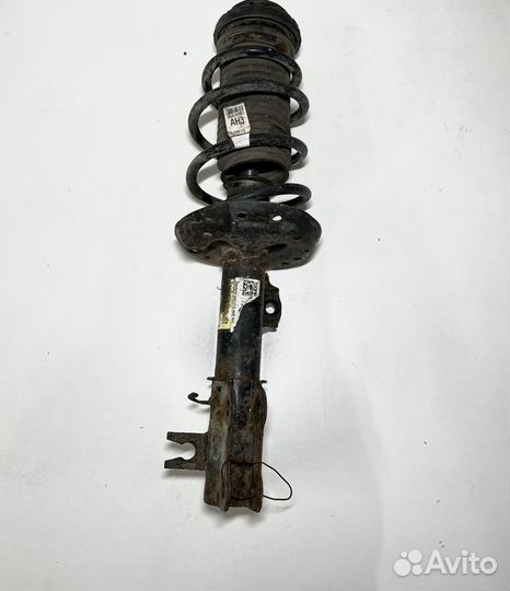 Амортизатор передний левый Chevrolet Aveo T300