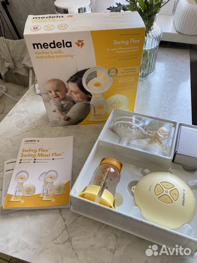 Молокоотсос medela swing электрический