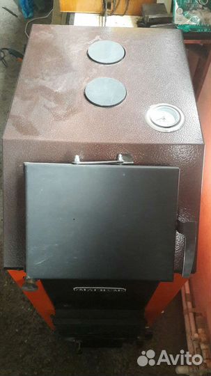 Продам котел отопительный уголь-дрова