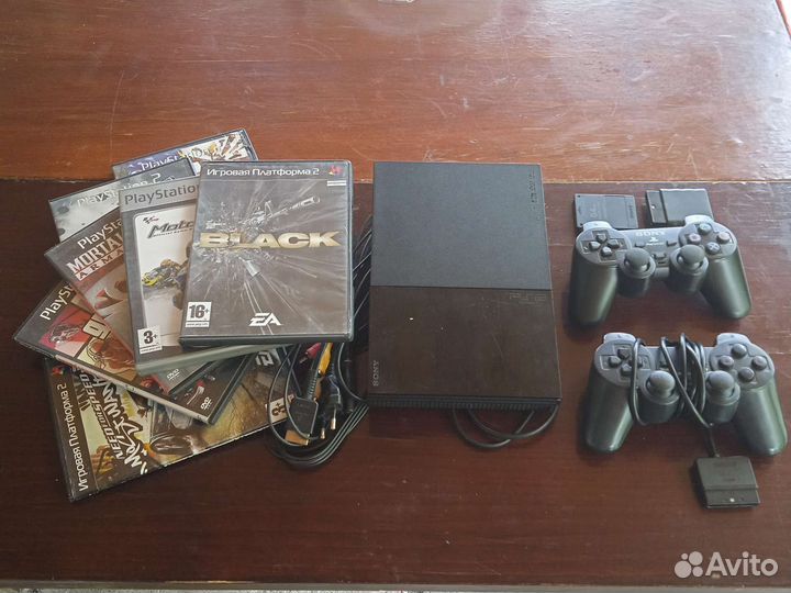 Sony PS2 прошитая (49 дисков)