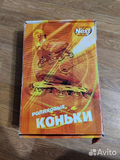 Роликовые коньки