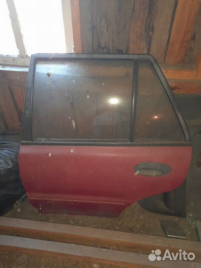 Двери на лансер 5