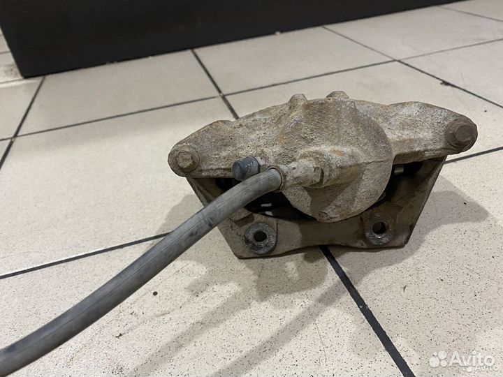 Тормозной суппорт передний левый Ford Mondeo 3